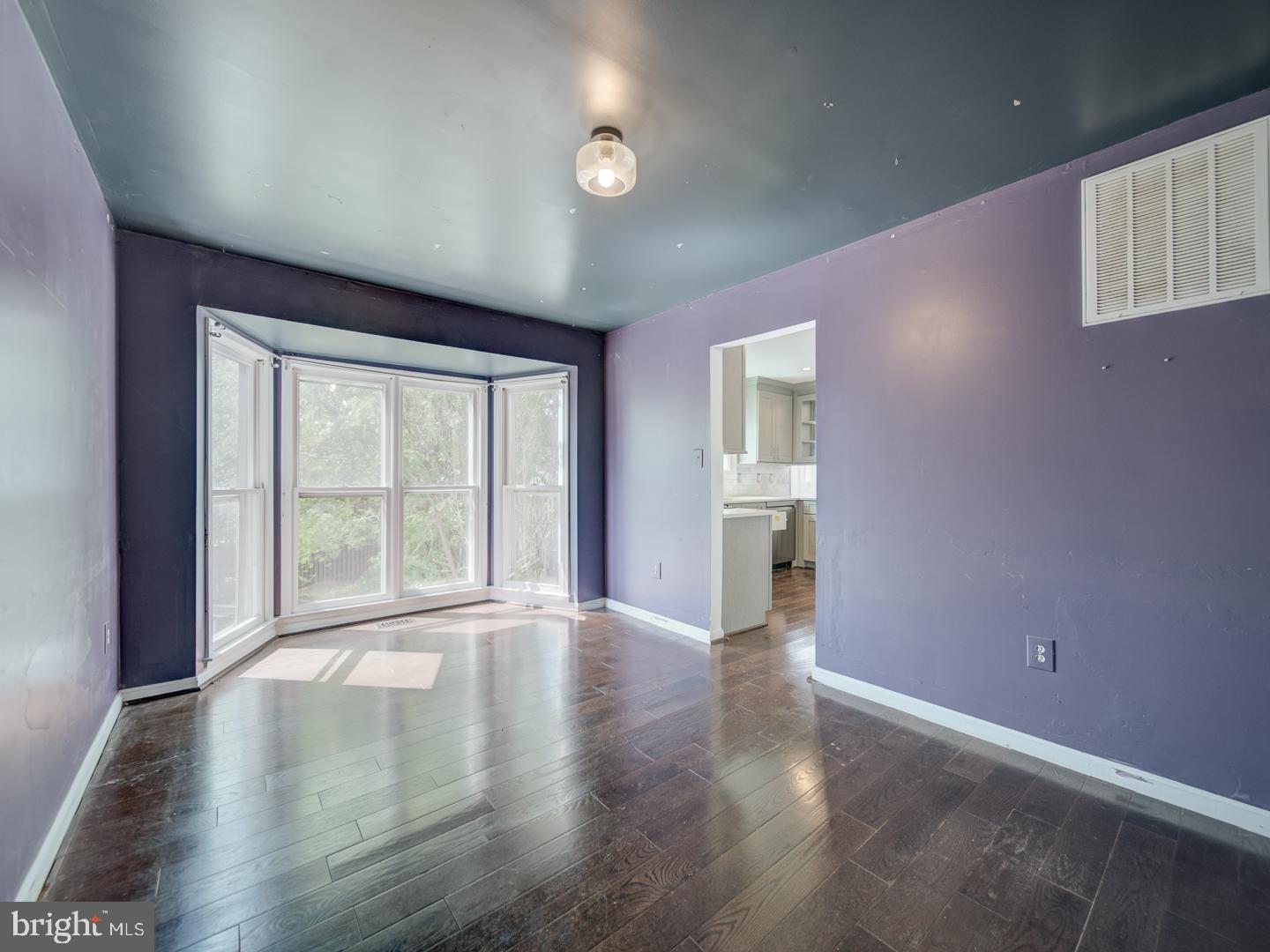 9618 Clover Hill Road Manassas, VA 20110 - Photo 21 of 61 an empty room with wooden floor and windows