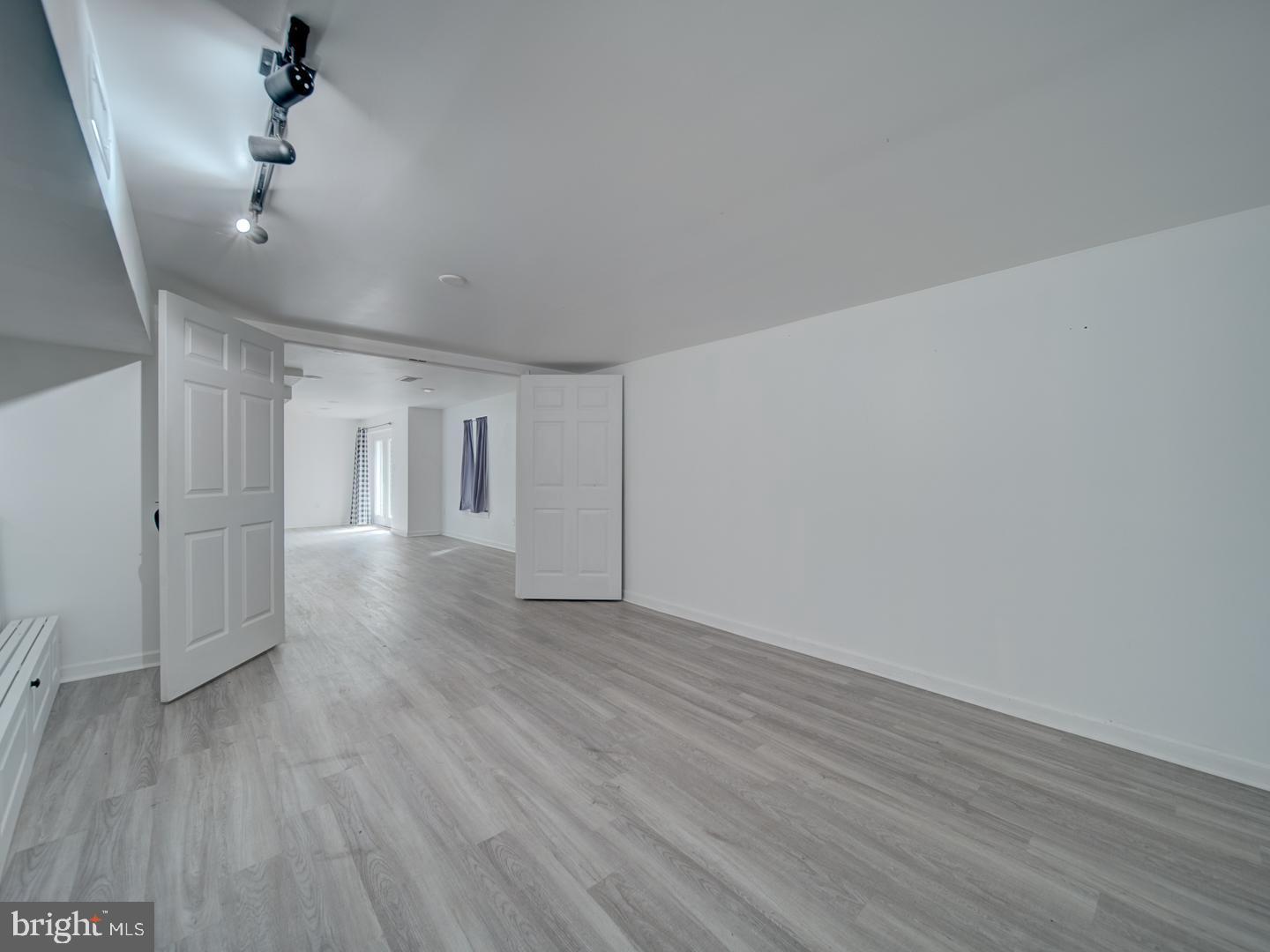 9618 Clover Hill Road Manassas, VA 20110 - Photo 58 of 61 a view of empty room with wooden floor