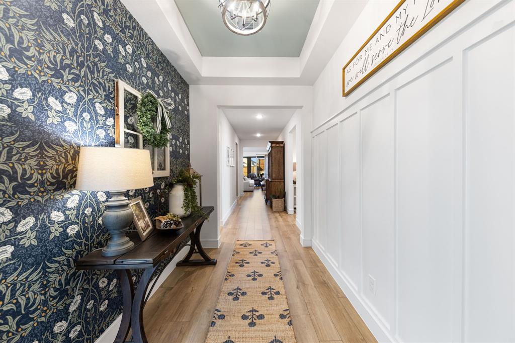 1340 Cartona Road Fate, TX 75087 - Photo 6 of 32 a view of a hallway with furniture
