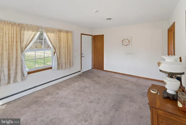 a view of livingroom with furniture and window