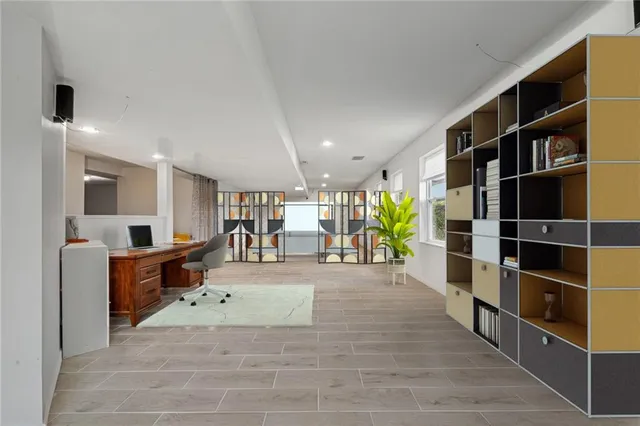 a view of a roof deck with furniture