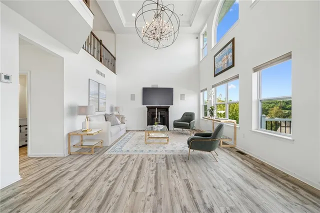 a living room with furniture and a table