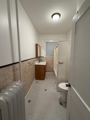 466 Locust Street, Unit 2 Fall River, MA 02720 - Photo 10 of 10 a bathroom with a sink toilet and shower
