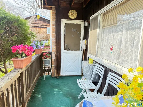 a front view of a house with patio