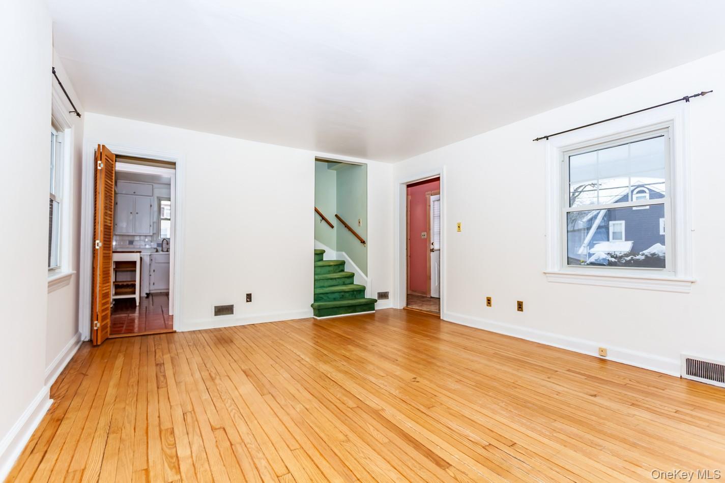 530 Union Avenue Peekskill, NY 10566 - Photo 14 of 32 door to kitchen on left, stairs to go upstairs and entry foyer to the right