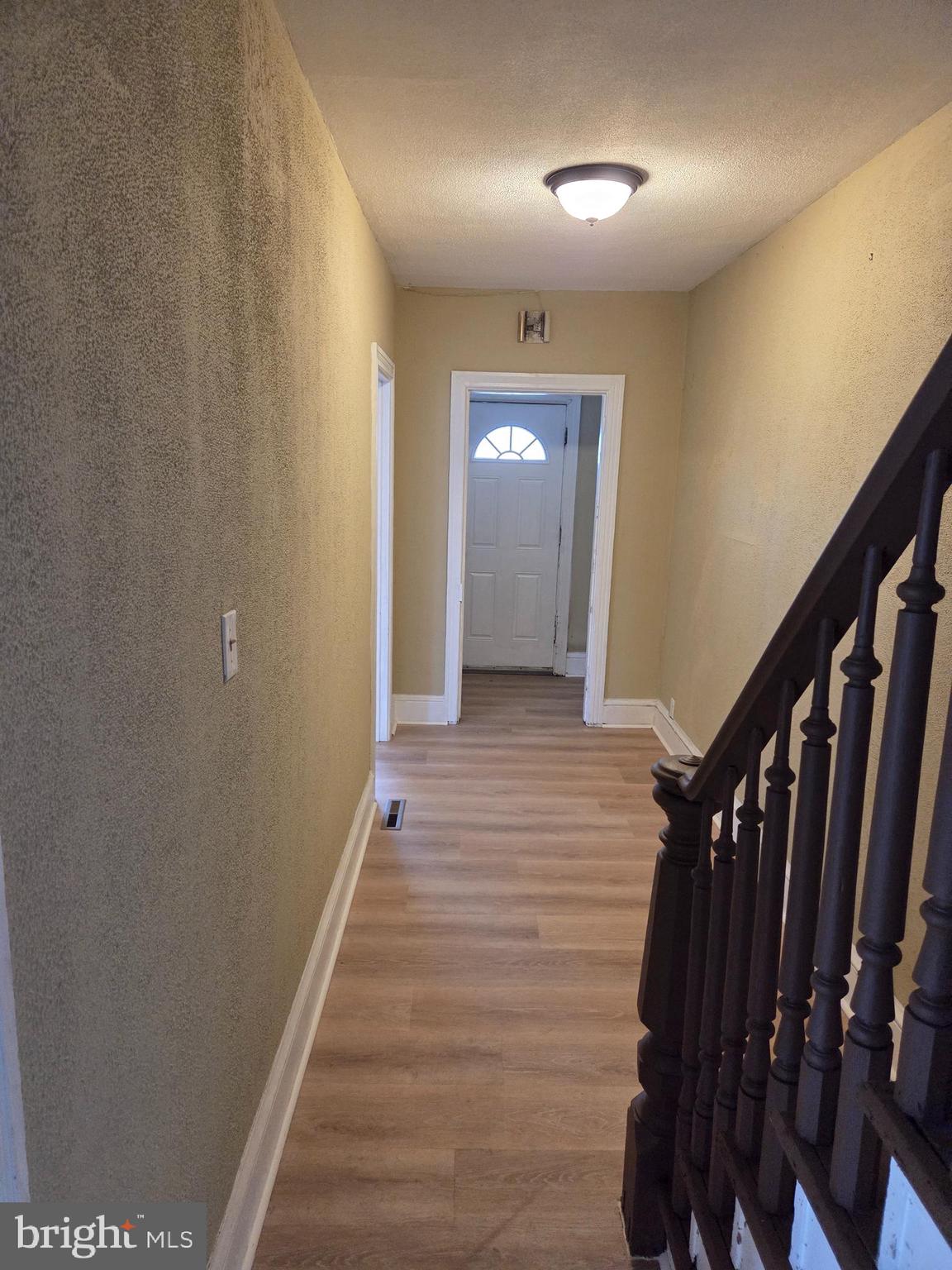 649 Bordentown Road Burlington, NJ 08016 - Photo 5 of 20 a view of a hallway with wooden floor