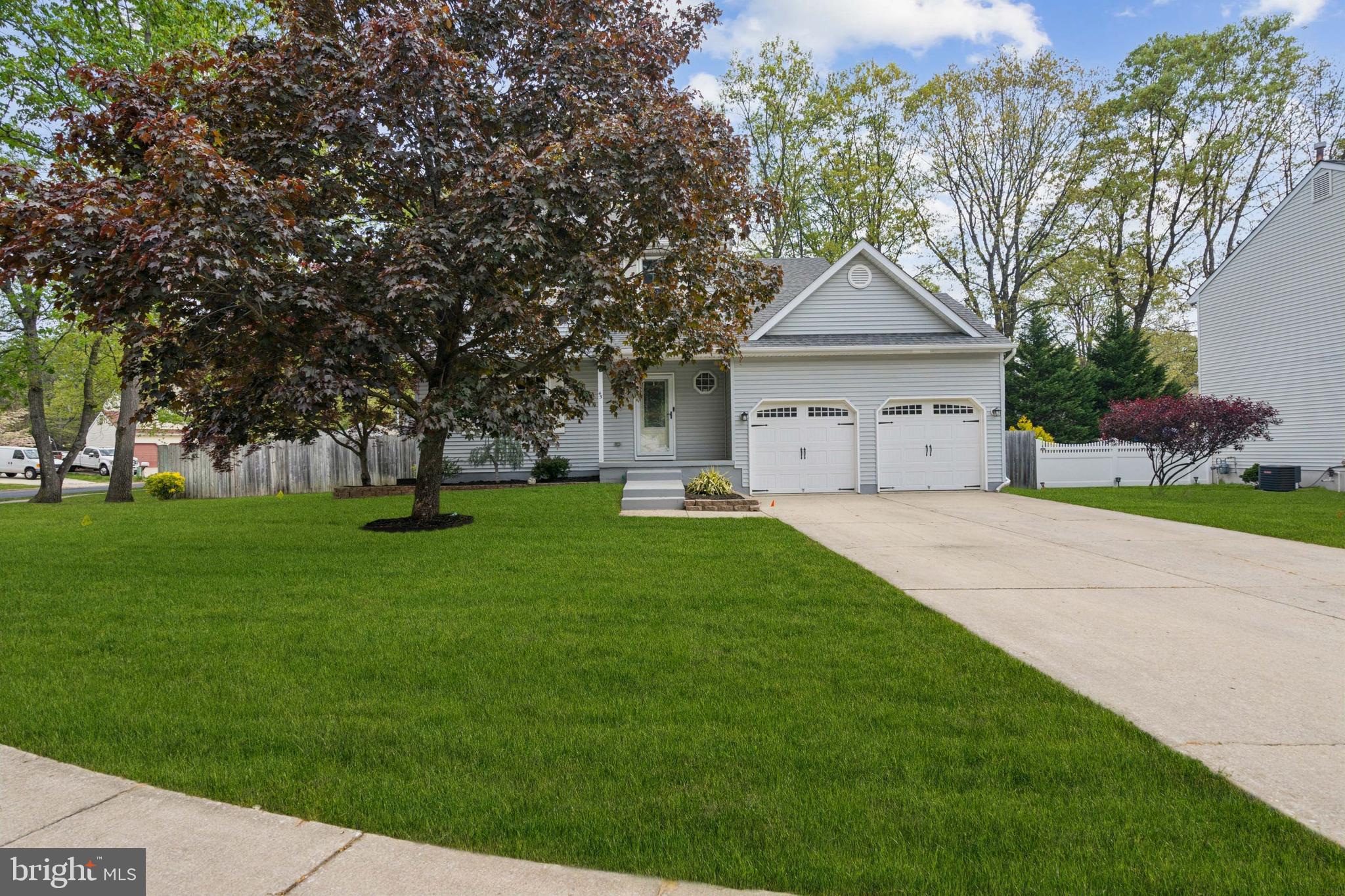 45 Country Club Road Pine Hill, NJ 08021 - Photo 1 of 25 a house with green field in front of it