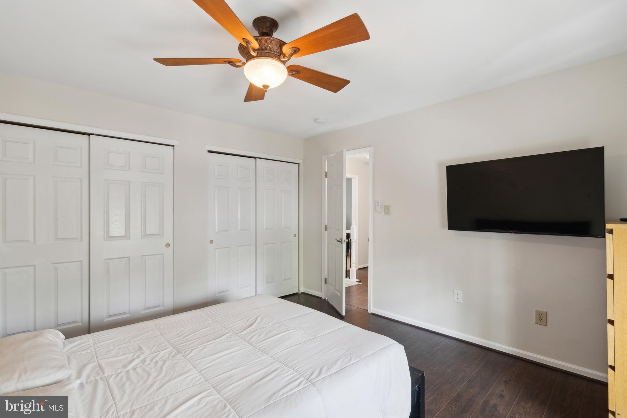 45 Country Club Road Pine Hill, NJ 08021 - Photo 14 of 25 a bedroom with a bed and a flat screen tv