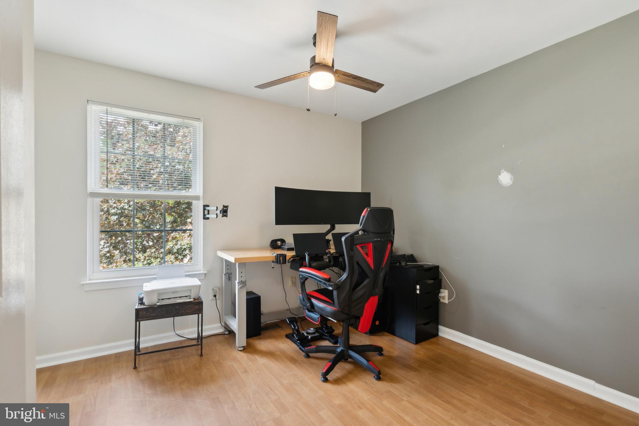 45 Country Club Road Pine Hill, NJ 08021 - Photo 15 of 25 a view of a workspace with furniture and a window