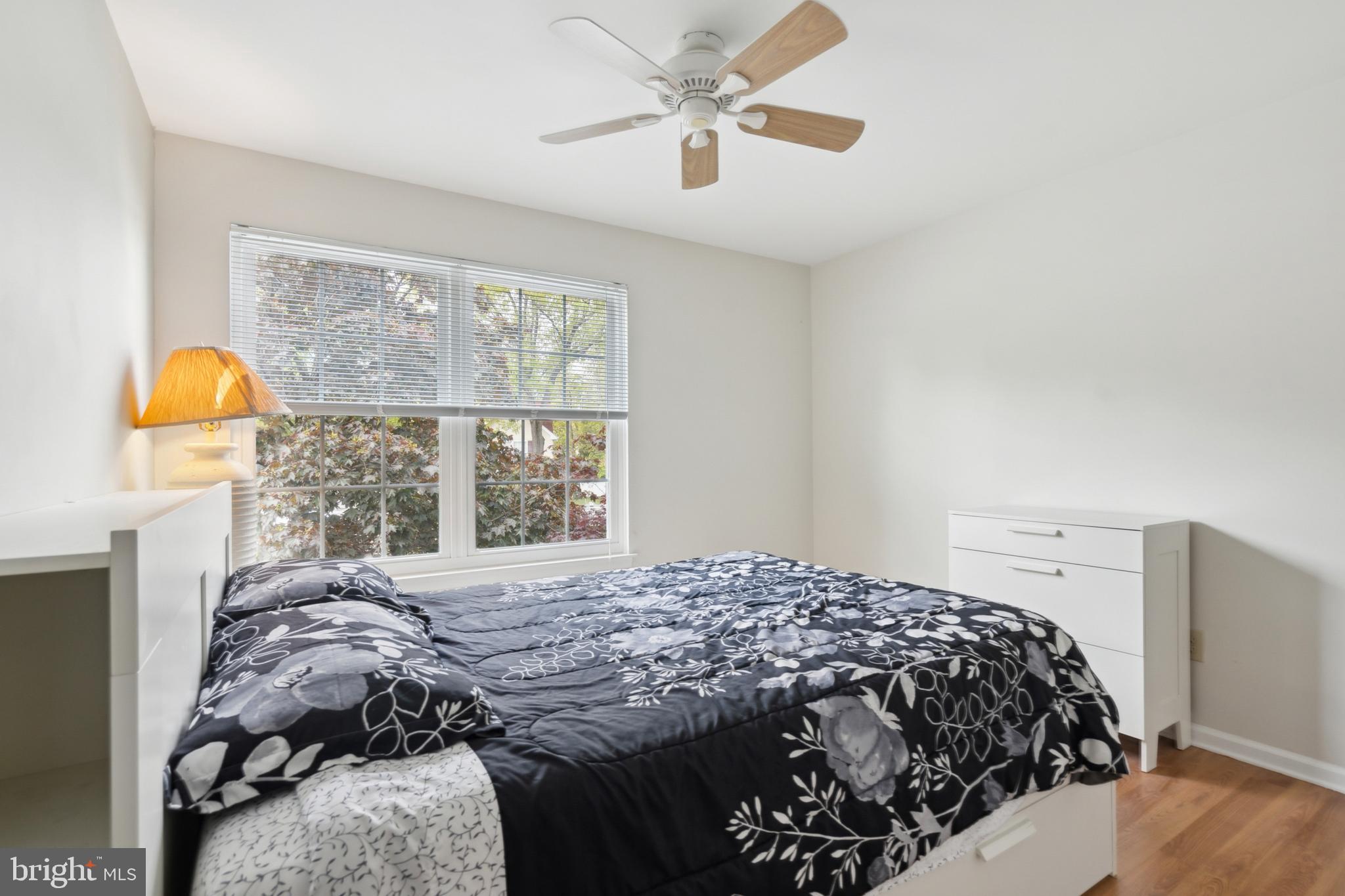 45 Country Club Road Pine Hill, NJ 08021 - Photo 16 of 25 a bedroom with a bed and a window