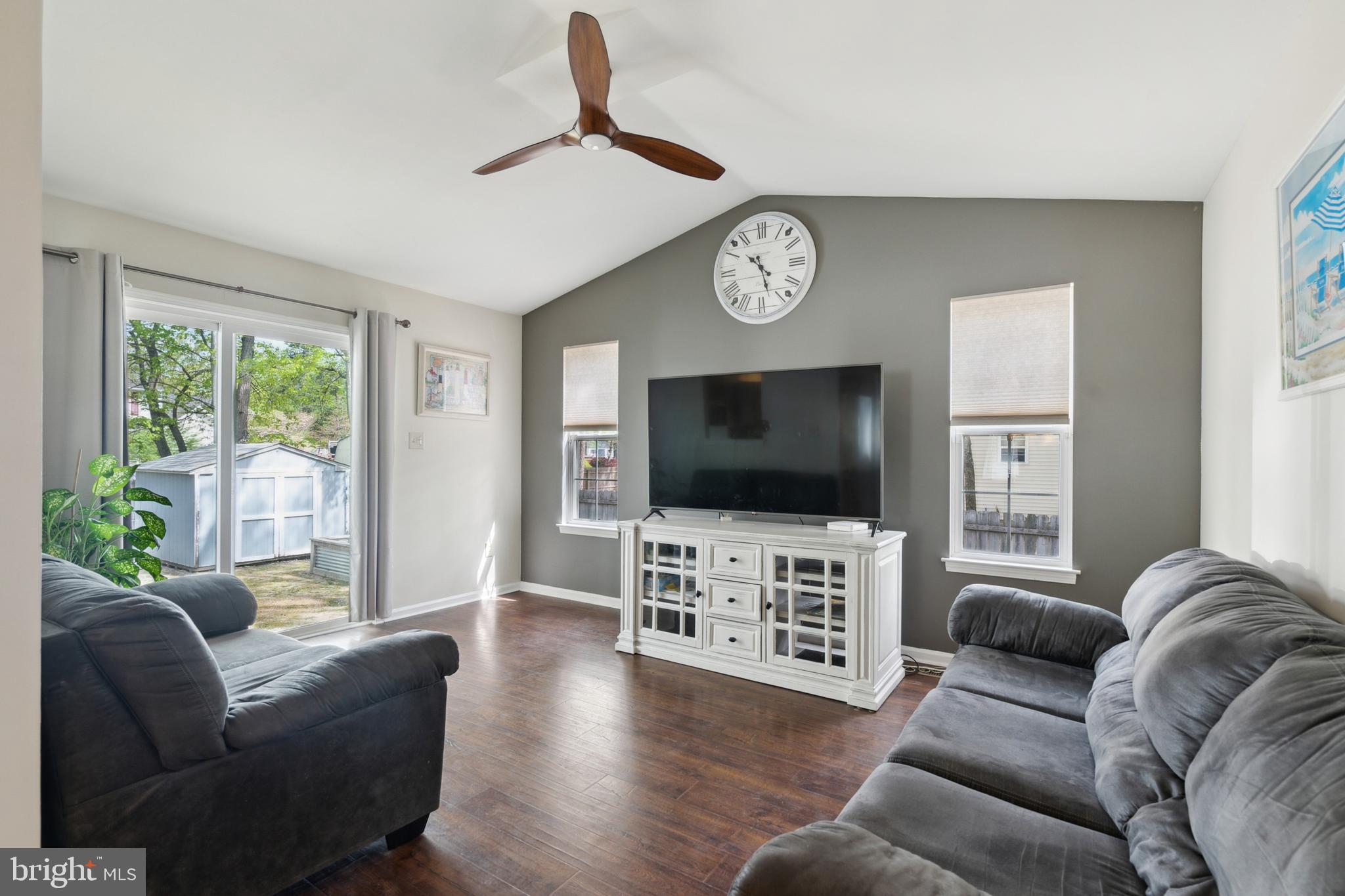 45 Country Club Road Pine Hill, NJ 08021 - Photo 9 of 25 a living room with furniture and a flat screen tv