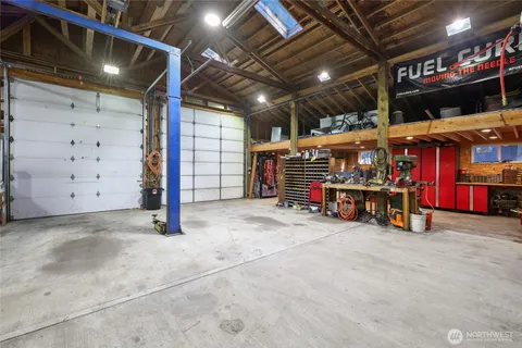 a view of a store room with parking space
