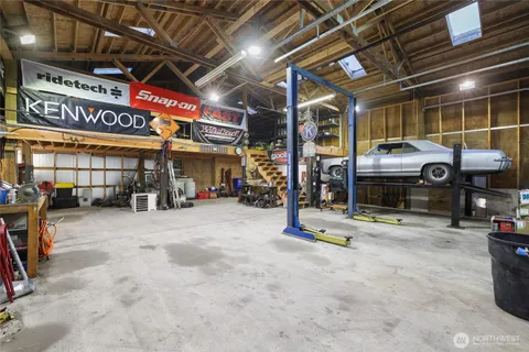 a front view of a house with parking area