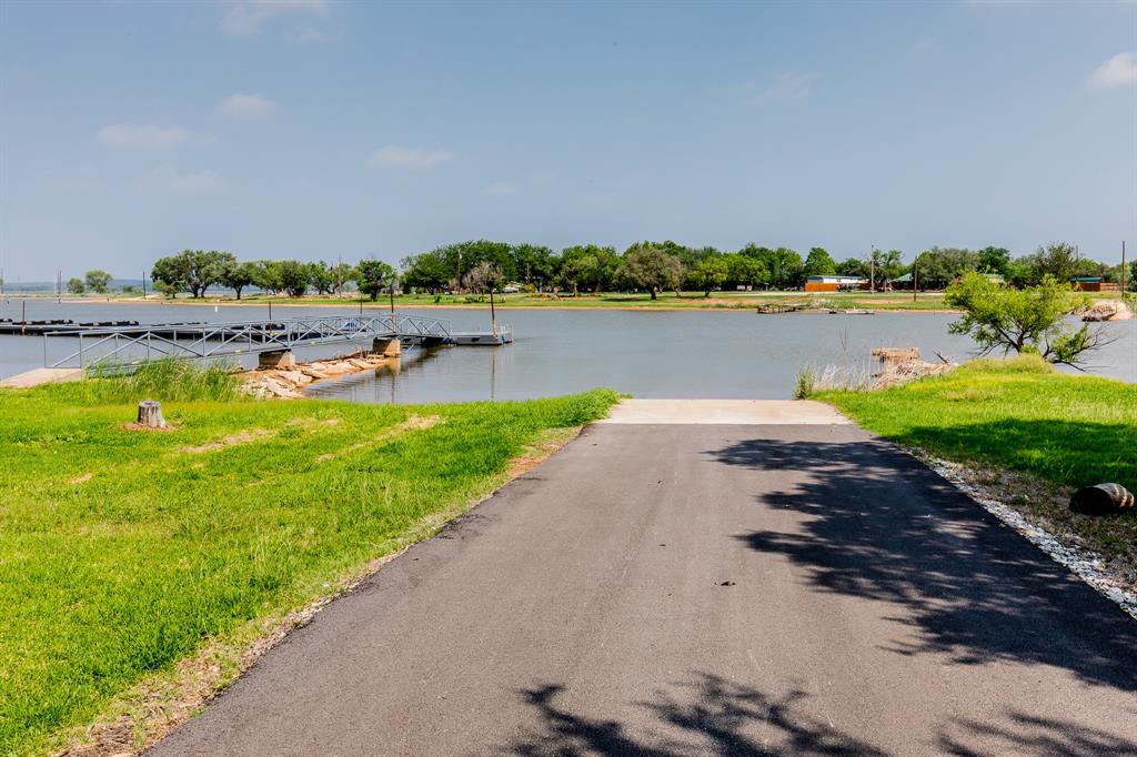 Tbd Tbd Green Graford, TX 76449 - Photo 11 of 14 a view of a lake with a city view