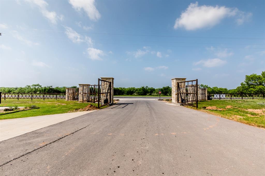 Tbd Tbd Green Graford, TX 76449 - Photo 7 of 14 a view of a house with a yard and a street view