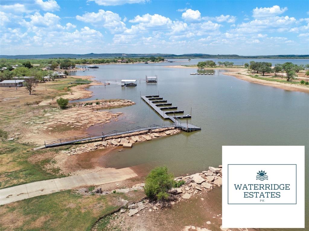 Tbd Tbd Green Graford, TX 76449 - Photo 10 of 14 a view of a lake with a city