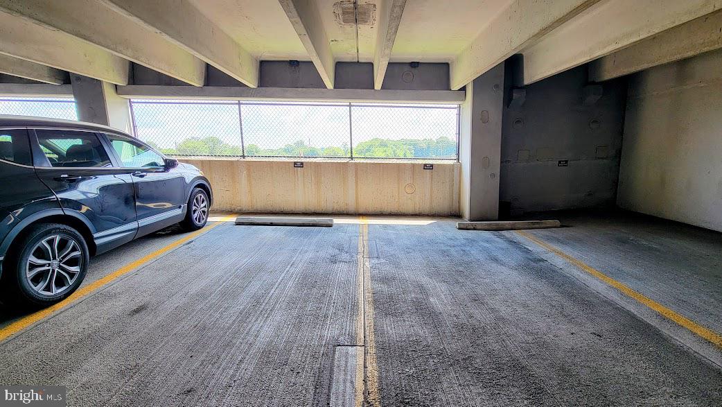 501 Hungerford Drive, Unit 207 Rockville, MD 20850 - Photo 22 of 23 a view of a car garage door