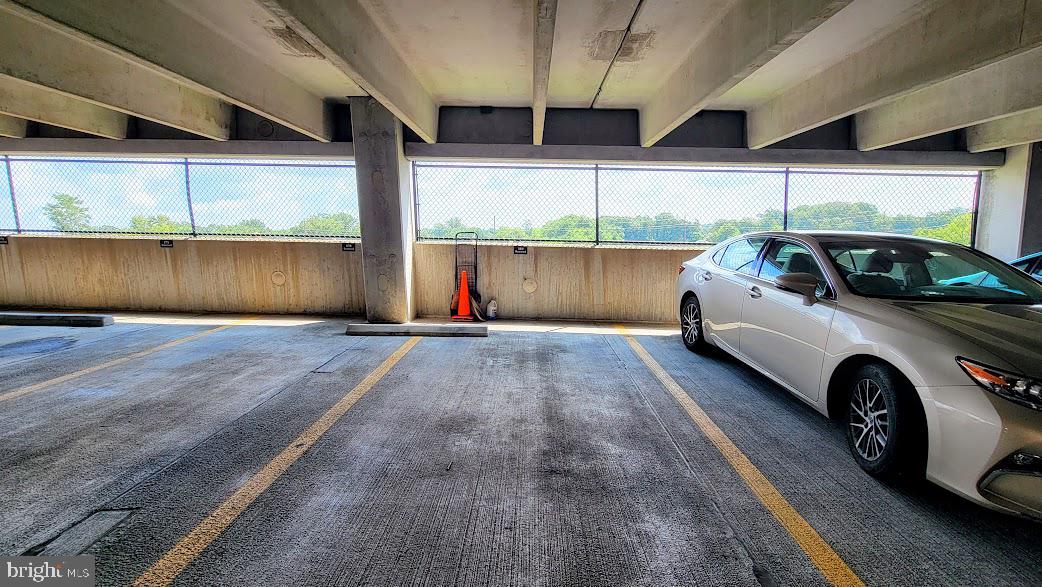 501 Hungerford Drive, Unit 207 Rockville, MD 20850 - Photo 23 of 23 a view of a car parking garage