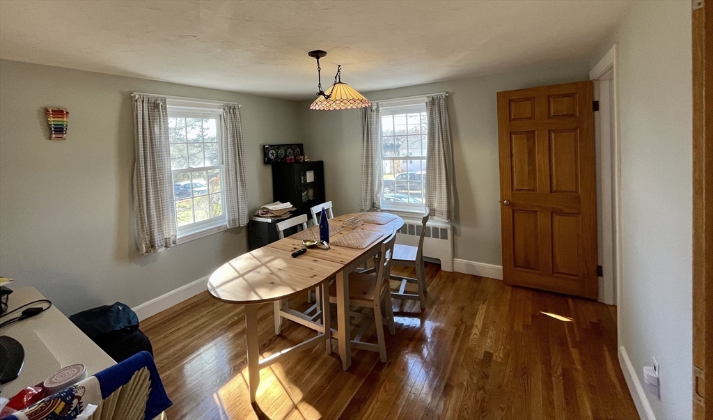 18 Lariviere Road Framingham, MA 01701 - Photo 5 of 8 a view of a dining room with furniture window and wooden floor