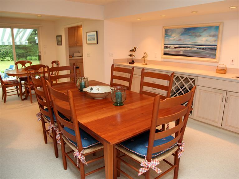 105 Scudder Road Osterville, MA 02655 - Photo 3 of 10 a dining room with furniture and wooden floor
