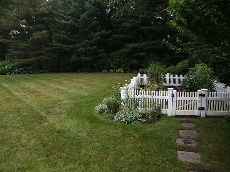 105 Scudder Road Osterville, MA 02655 - Photo 7 of 10 a view of a deck with a garden