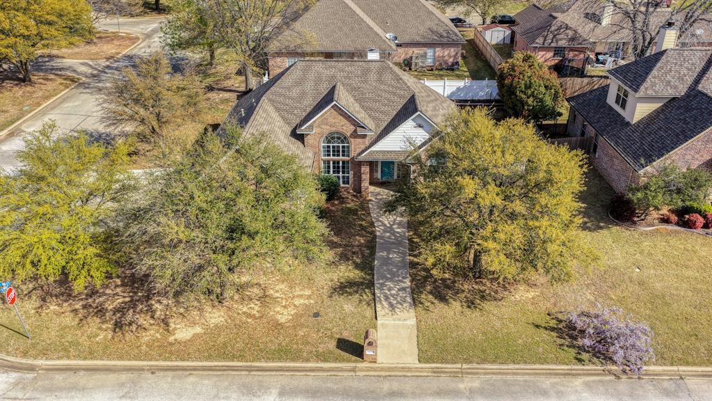 1106 Owl Street Decatur, TX 76234 - Photo 2 of 40 a view of a house with a yard