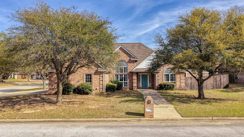 1106 Owl Street Decatur, TX 76234 - Photo 3 of 40 a front view of a house with a yard