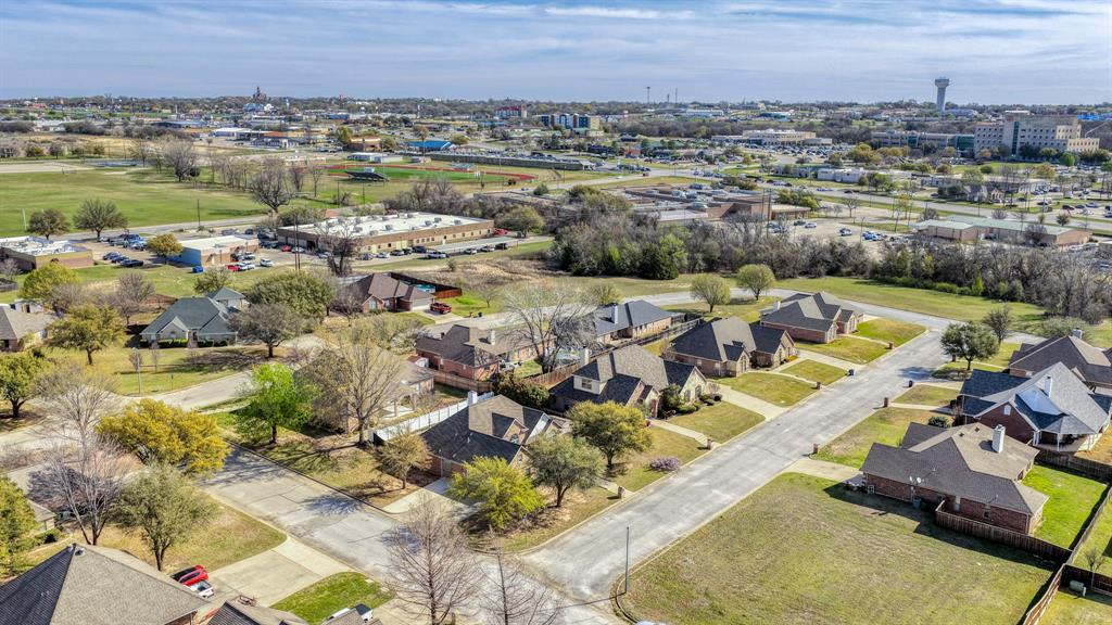 1106 Owl Street Decatur, TX 76234 - Photo 40 of 40 an aerial view of a house with a lake view