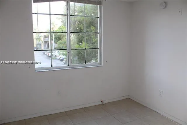 an empty room with a window