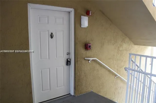 a view of an entryway with stairs