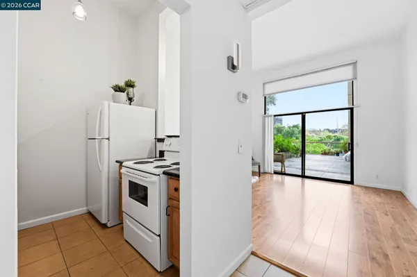 a view of a chairs and table in a backyard