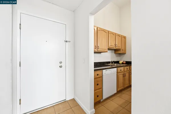 a chair and door in front of a door