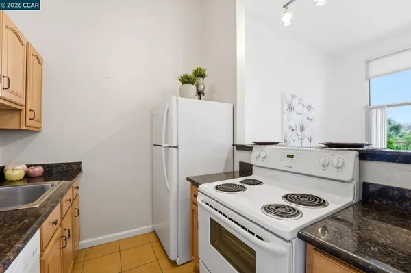 a view of a swimming pool with an outdoor seating