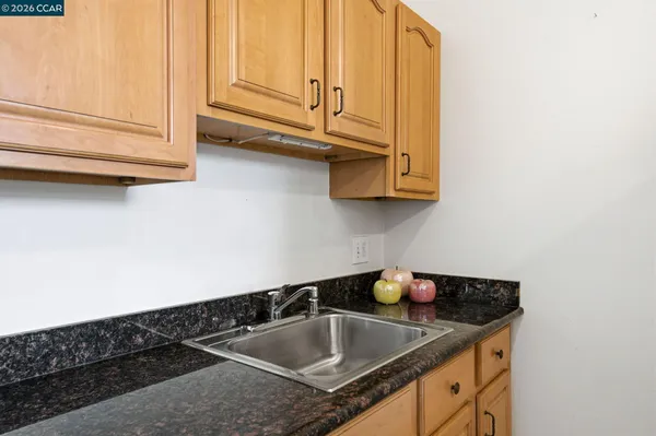 a view of outdoor space with deck and tree