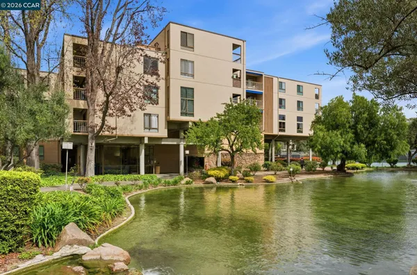 a house with river in front of it
