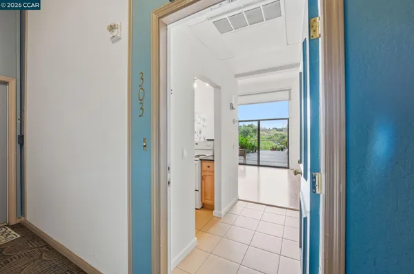 a view of a room with chair and wooden floor