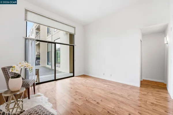 a kitchen with granite countertop a sink and cabinets