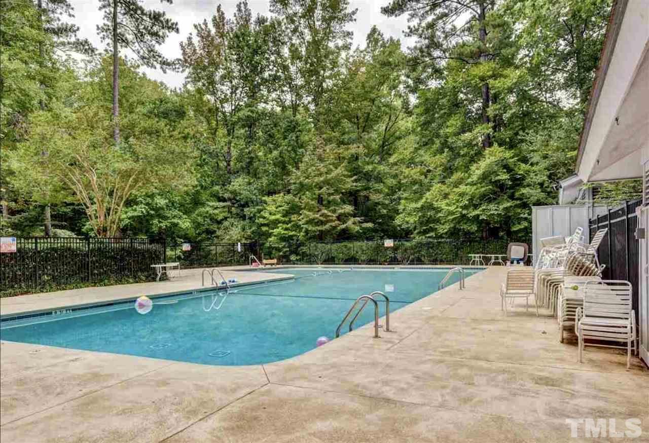 8816 Stage Ford Road Raleigh, NC 27615 - Photo 27 of 29 With clubhouse, overlooks a pond
