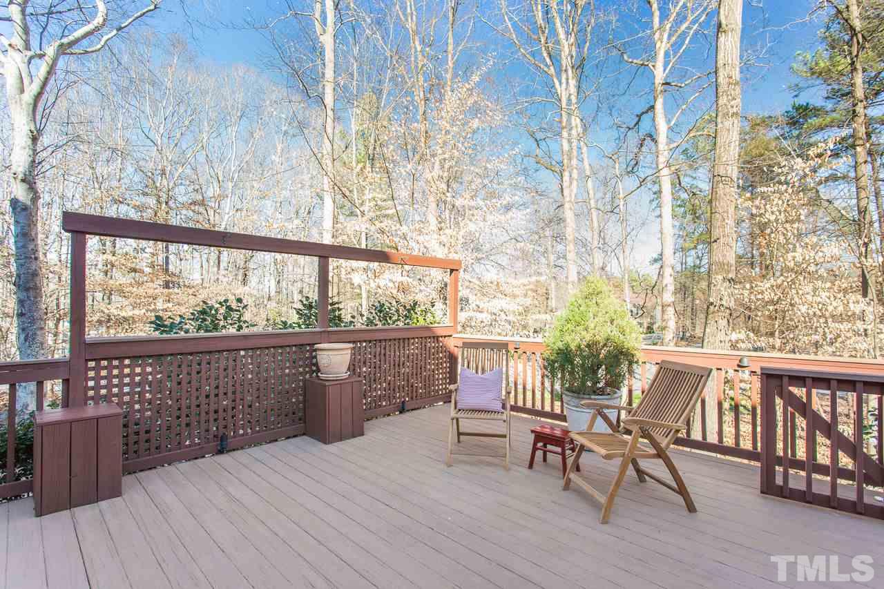 8816 Stage Ford Road Raleigh, NC 27615 - Photo 8 of 29 Railing, planters, and gated to keep the little ones and pets safe