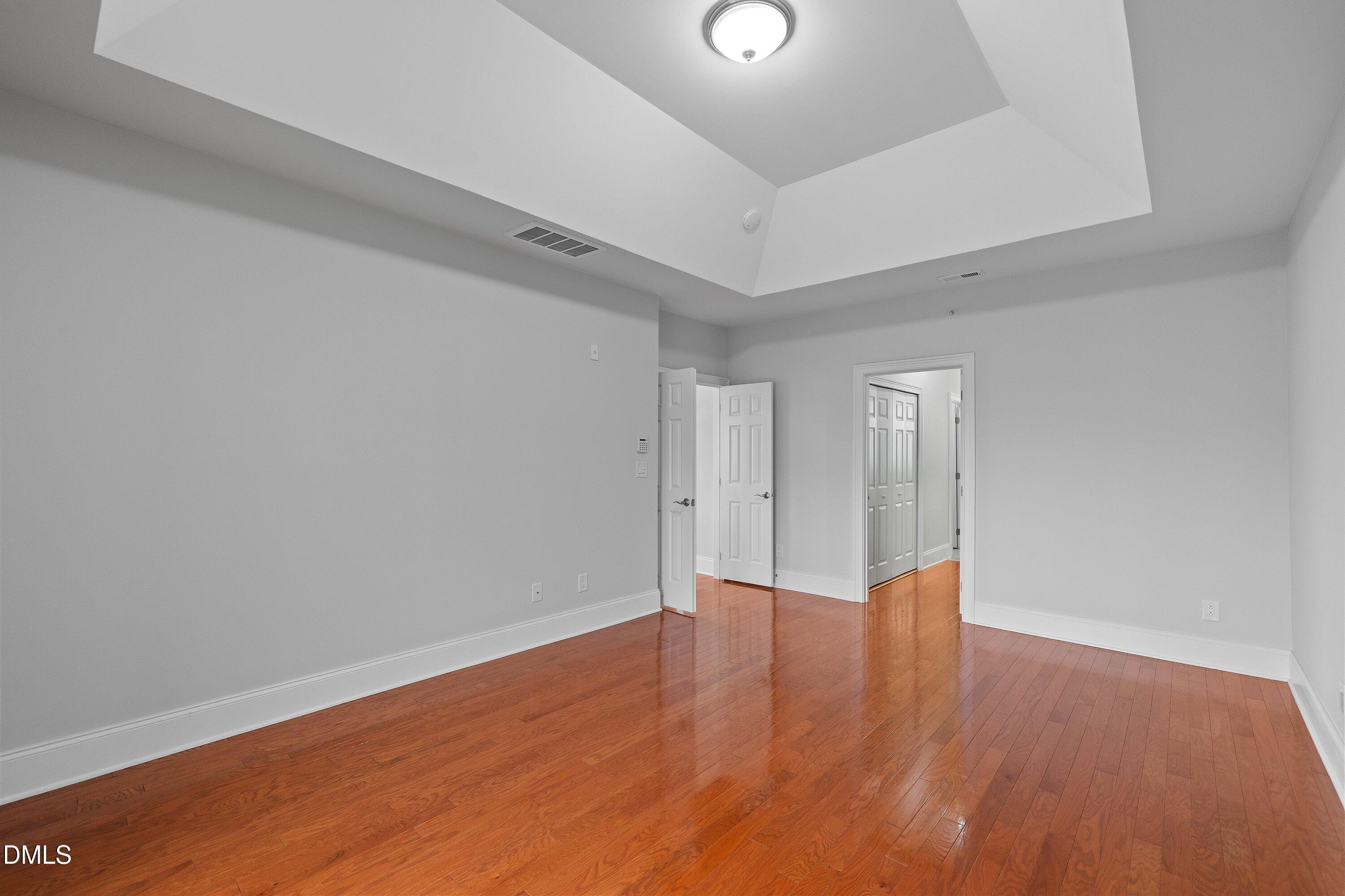 9211 Calabria Drive, Unit 205 Raleigh, NC 27617 - Photo 38 of 55 wooden floor in an empty room
