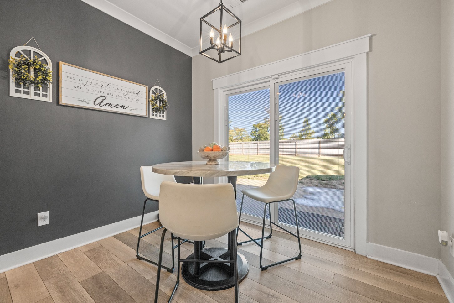 27 Hancock Road Fayetteville, TN 37334 - Photo 16 of 47 a dining room with furniture a chandelier and wooden floor