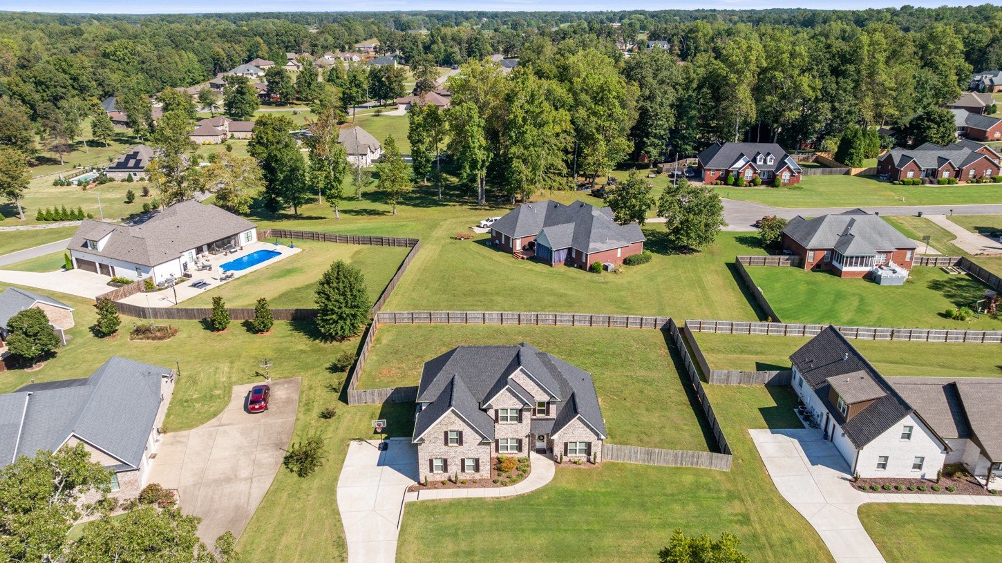 27 Hancock Road Fayetteville, TN 37334 - Photo 2 of 47 an aerial view of a swimming pool with a yard and mountain view in back