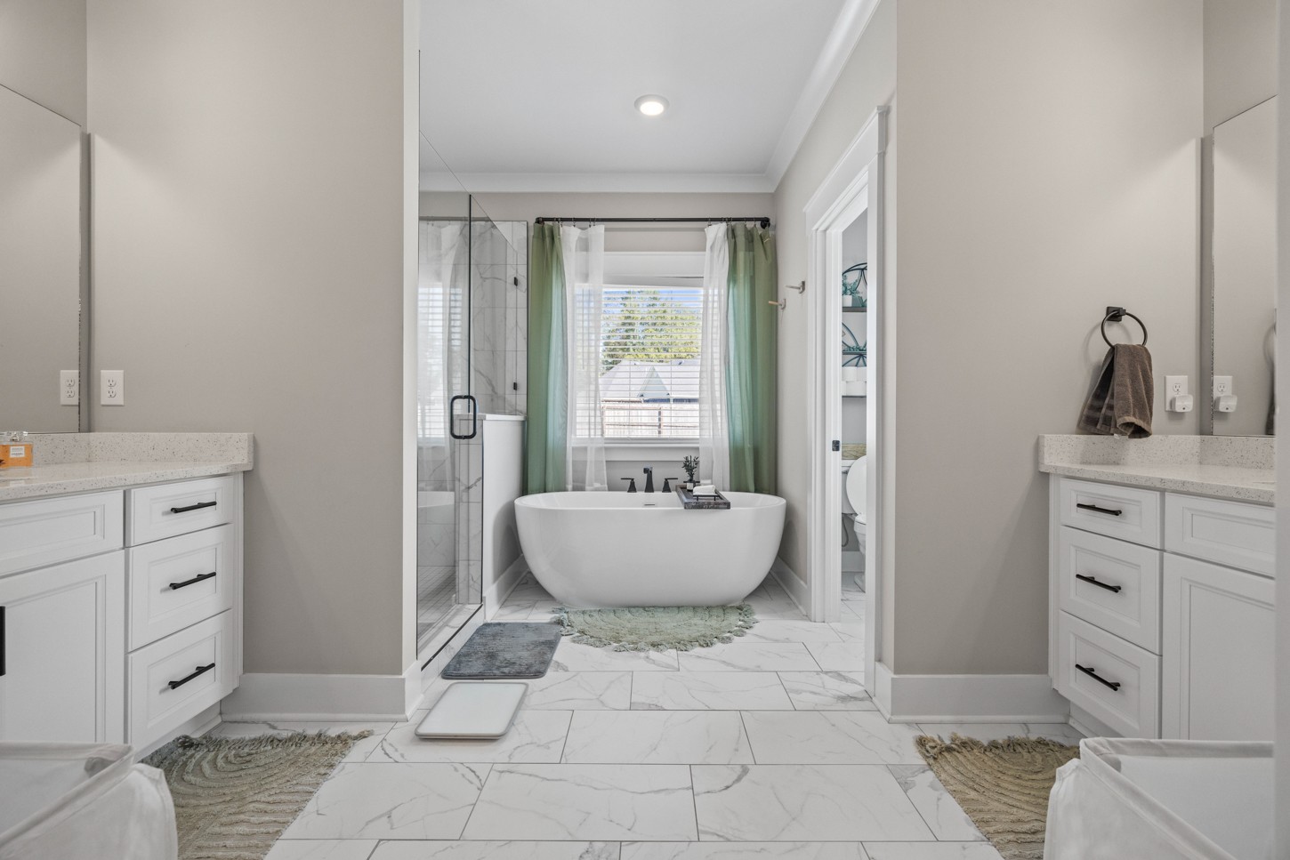 27 Hancock Road Fayetteville, TN 37334 - Photo 24 of 47 a spacious bathroom with a double vanity sink a mirror and a bathtub