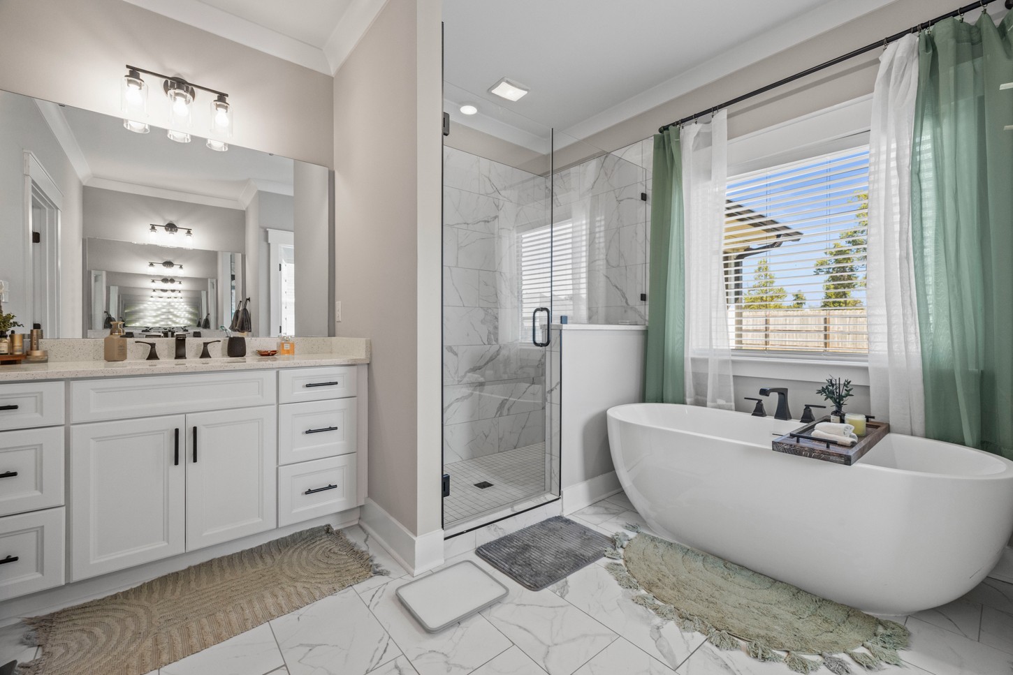 27 Hancock Road Fayetteville, TN 37334 - Photo 25 of 47 a spacious bathroom with a double vanity sink a mirror and a bathtub