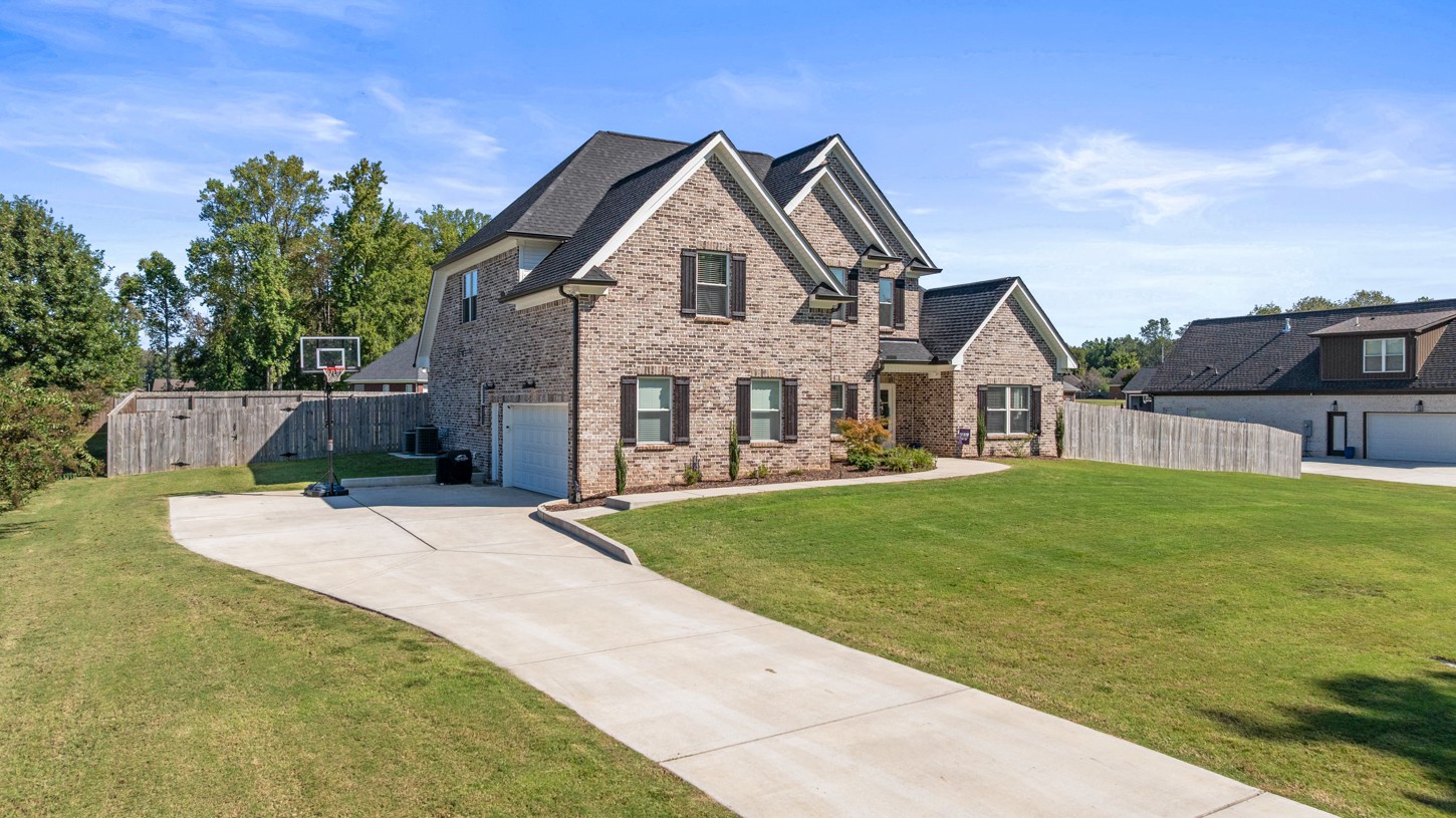 27 Hancock Road Fayetteville, TN 37334 - Photo 4 of 47 a view of an house with backyard and garden