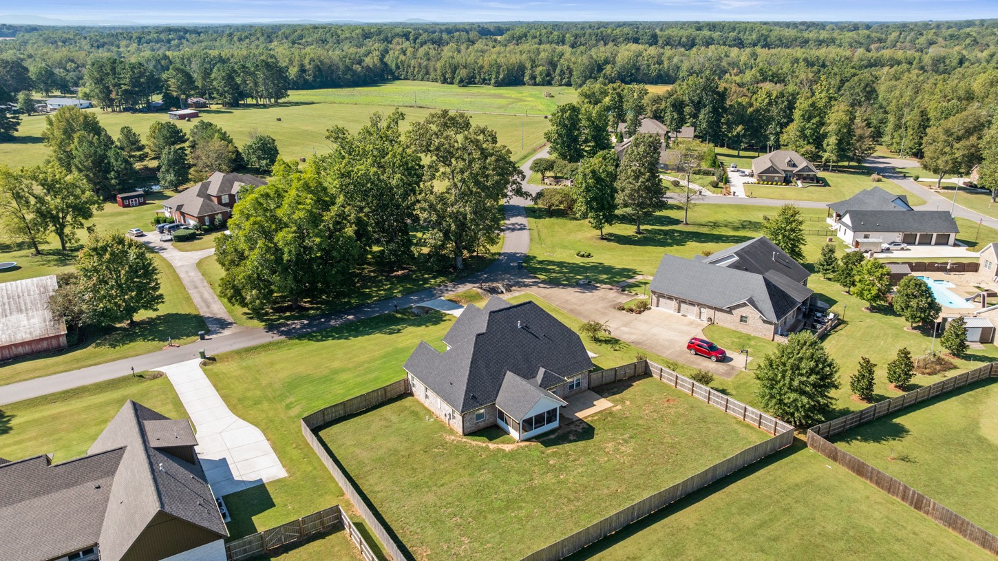 27 Hancock Road Fayetteville, TN 37334 - Photo 44 of 47 an aerial view of a house with garden space and outdoor seating