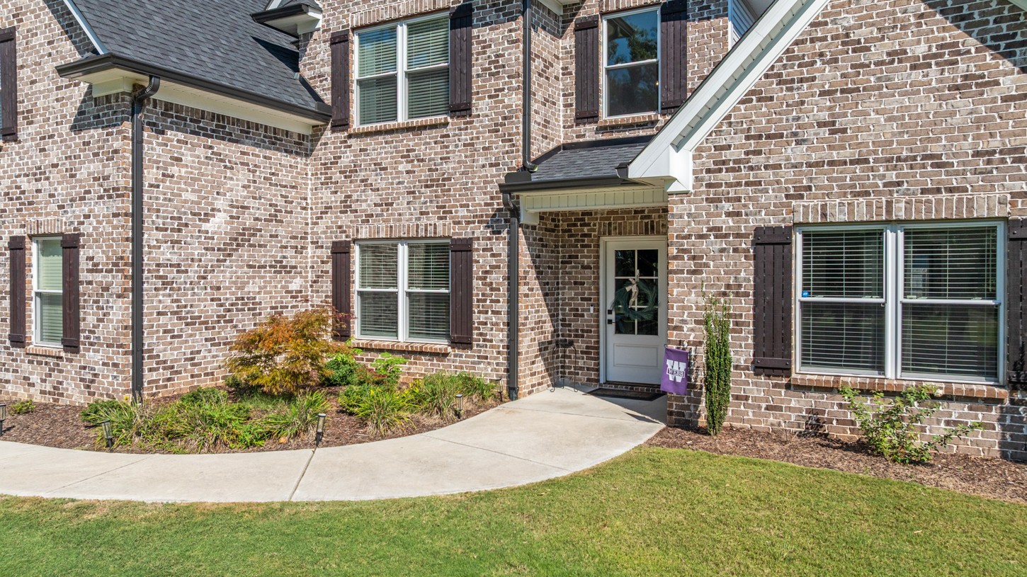 27 Hancock Road Fayetteville, TN 37334 - Photo 5 of 47 a front view of a house with a yard