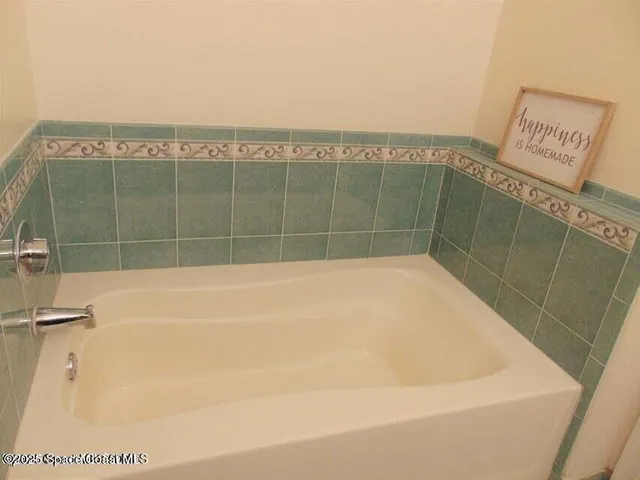 a bathroom with a bathtub