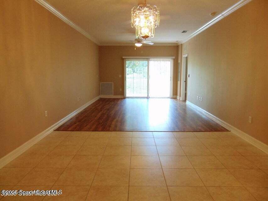 2087 Hidden Grove Lane, Unit 105B Merritt Island, FL 32953 - Photo 10 of 22 a view of livingroom and window