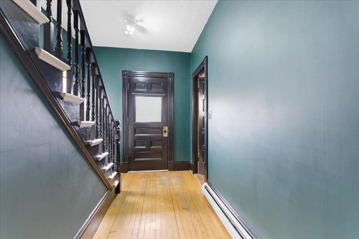 9 Harlow Hill Road Mexico, ME 04257 - Photo 16 of 44 Front hallway & stairway